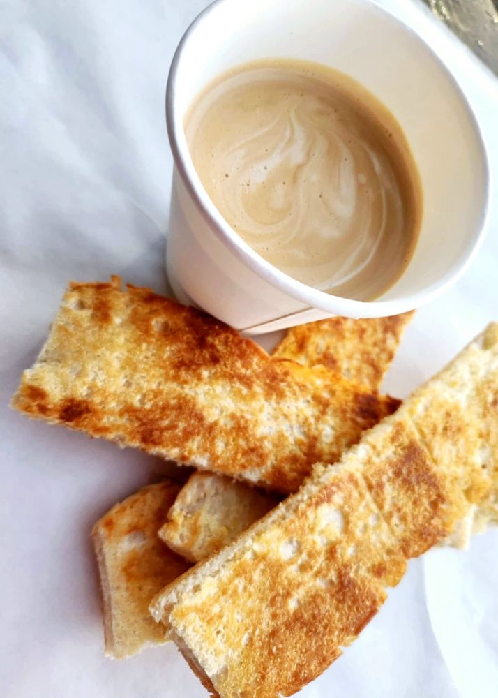 Pan tostado with café con leche, made fresh