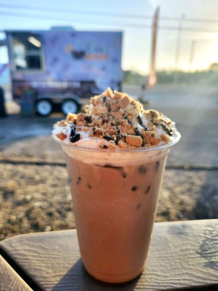 Iced specialty coffee at sunset